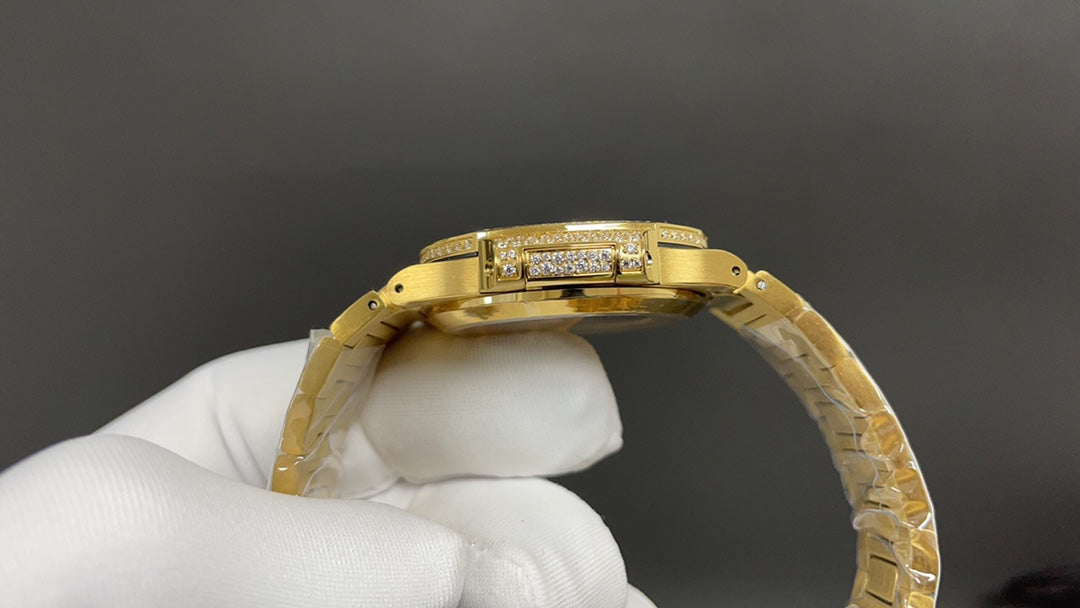 Patek Philippe Nautilus 7010 – “Gold Iced Out” (aftermarket) — Patek Philippe